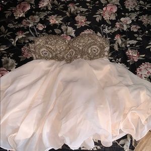 This a homecoming dress never been worn before.